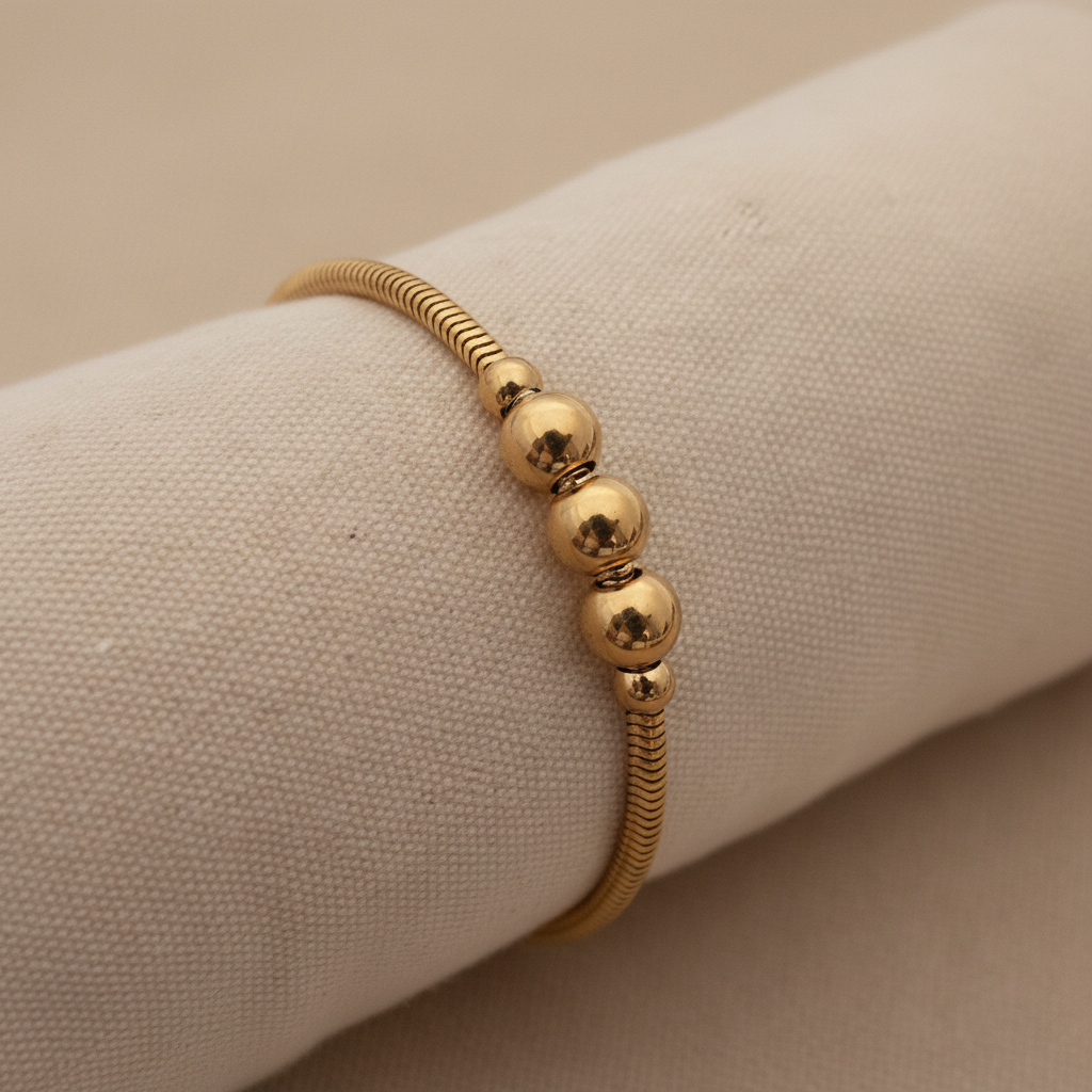 Bracelet serpent doré perles - gros plan perles